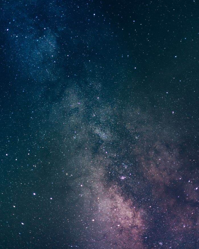 A stunning vertical capture of the Milky Way galaxy, showcasing vibrant stars and cosmic beauty.
